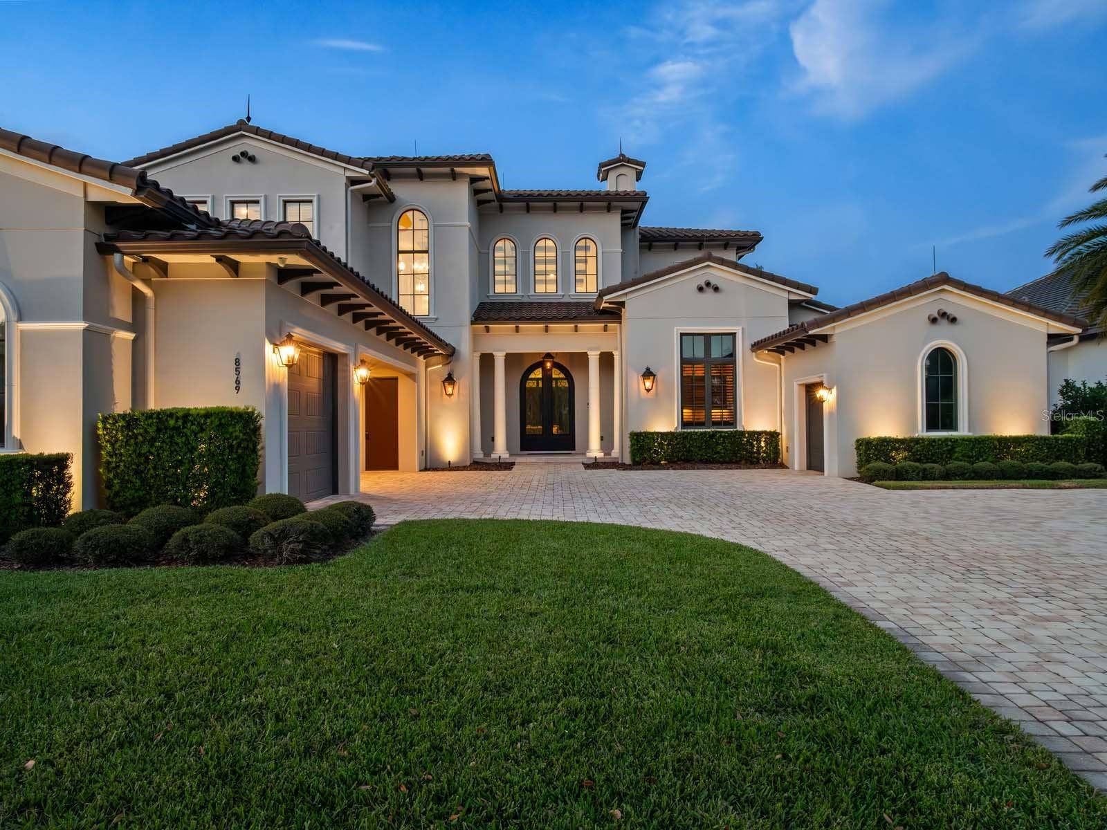 8569 LAKE NONA SHORE DRIVE, Orlando, FL 32827 Front Exterior Twilight