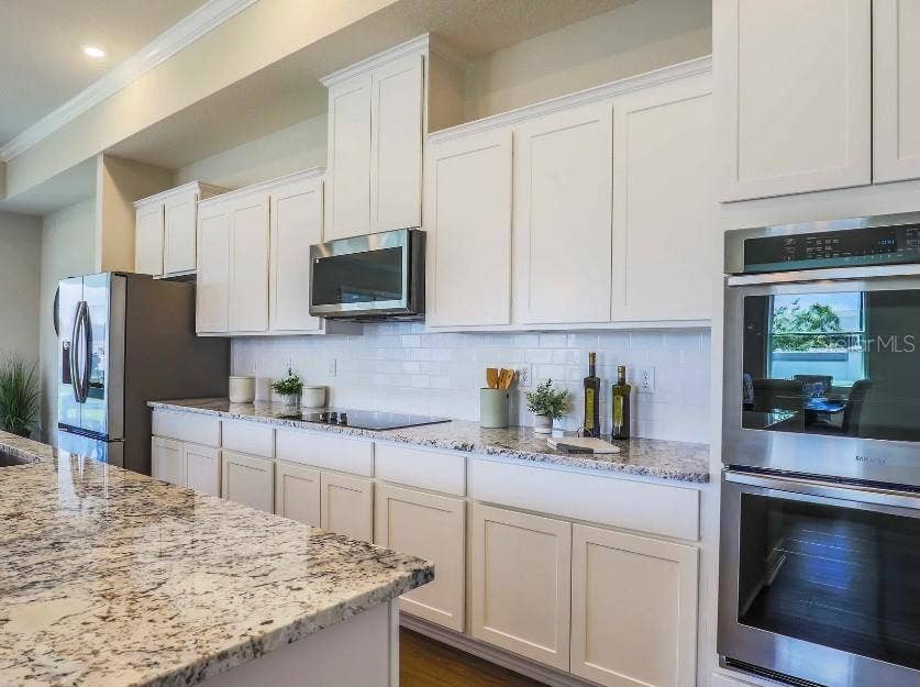 930 BUCKEYE DRIVE, Lady Lake, FL 32159 Model home - actual features may vary.