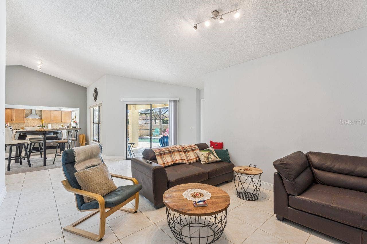 8215 ROLLA COURT, Orlando, FL 32836 Living room