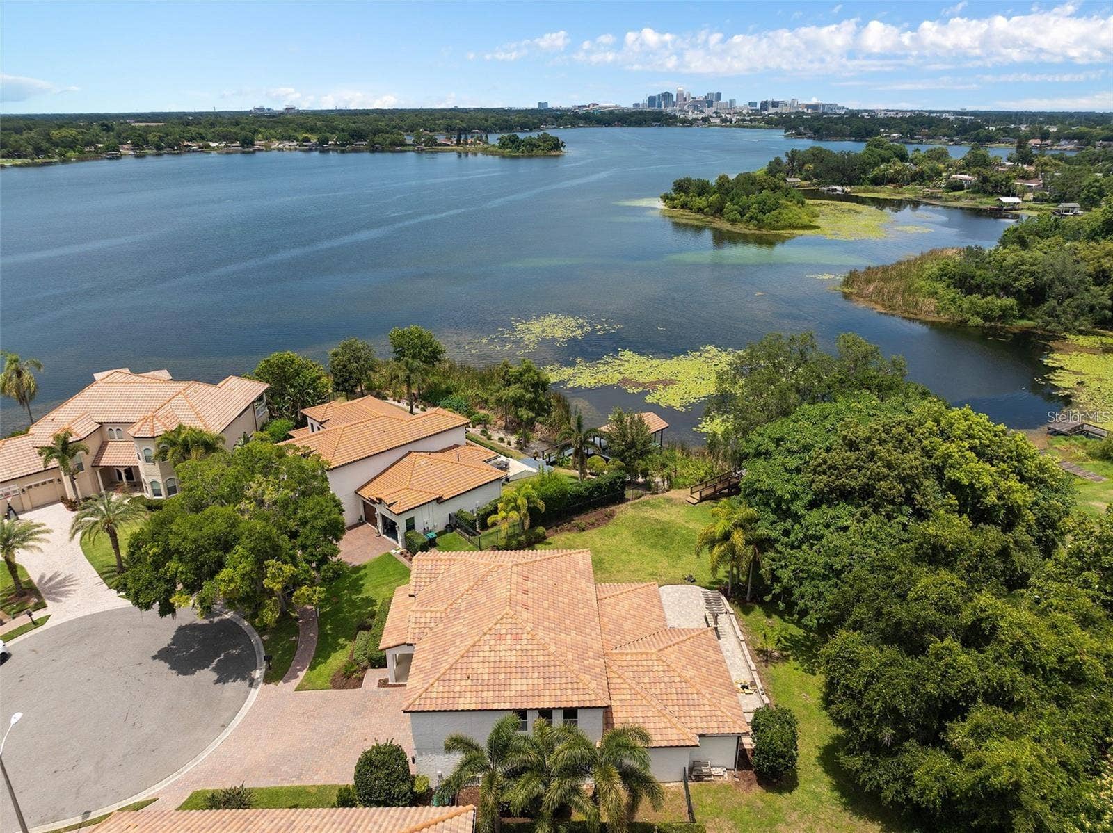 4509 PATRICIA ANN COURT, Orlando, FL 32839 Drone shot of the home and Lake Holden