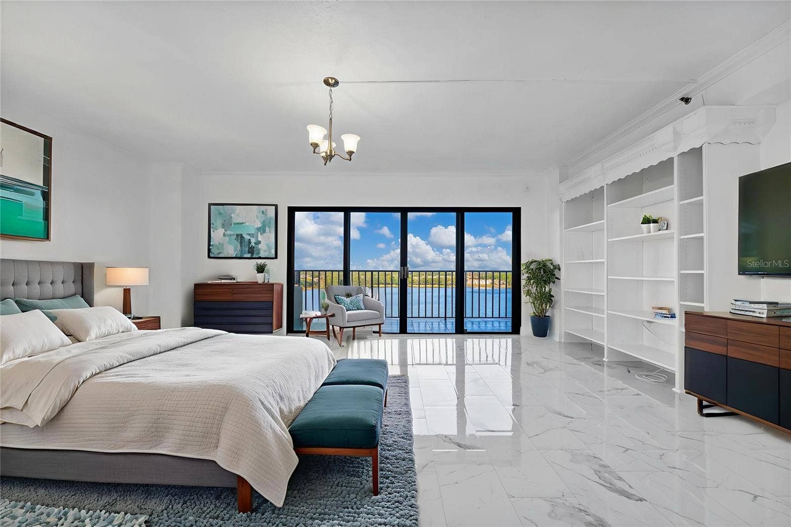 7550 HINSON STREET, #10A, Orlando, FL 32819 Master bedroom virtual staged.