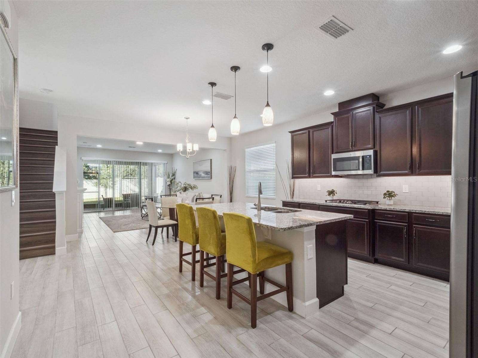14345 WABASSO LOOP, Winter Garden, FL 34787 Beyond Foyer - Kitchen, Dining, Living