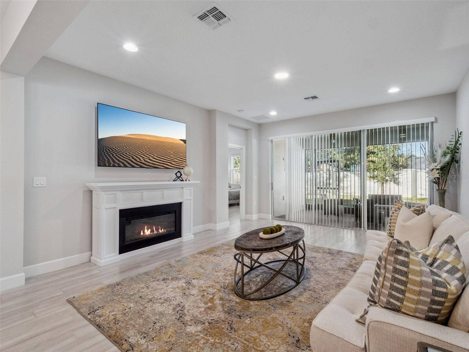 14345 WABASSO LOOP, Winter Garden, FL 34787 Living Room to Lanai + Primary