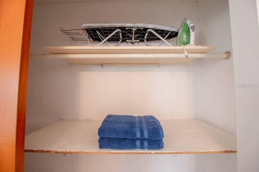 3120 PEEL AVENUE, Orlando, FL 32806 Closet, ironing board, iron, additional towels