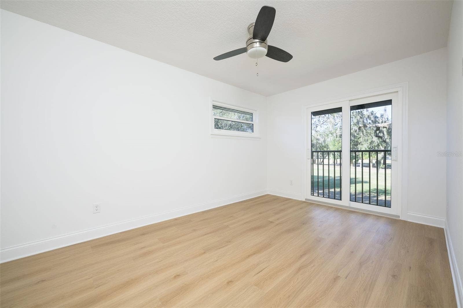 Upstairs guest bedroom overlooking the golf course.