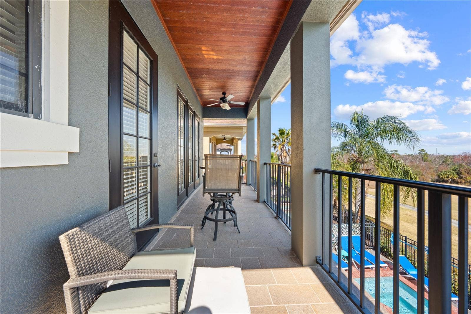 785 GOLDEN BEAR DRIVE, Reunion, FL 34747 Primary suite balcony