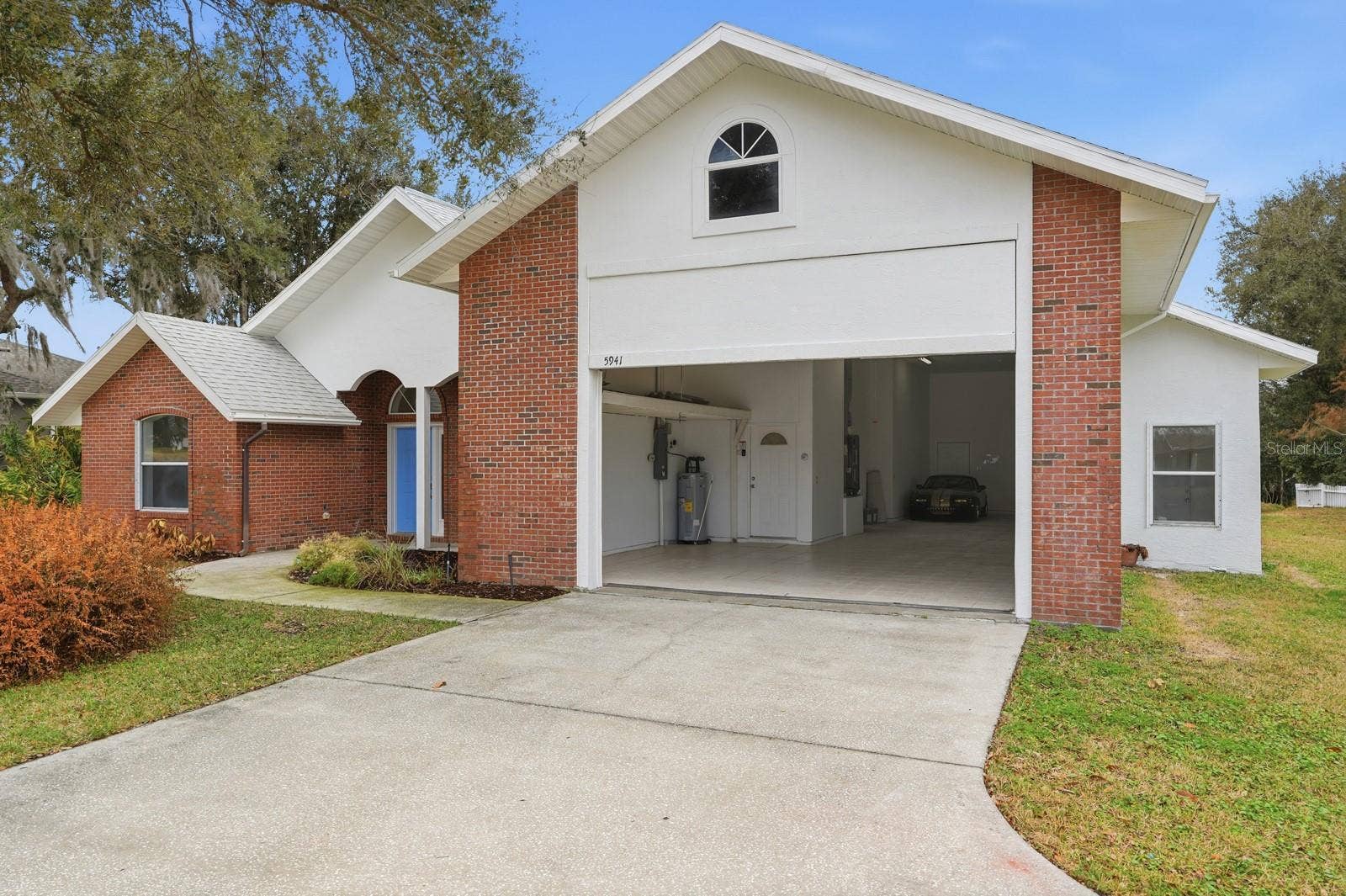 Garage open to almost 14 feet.