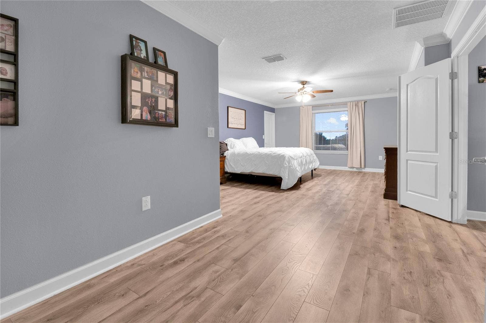 1301 GLENEAGLES LANE, Davenport, FL 33896 Master Bedroom bonus space can be used for a sitting area, office space, home gym, etc