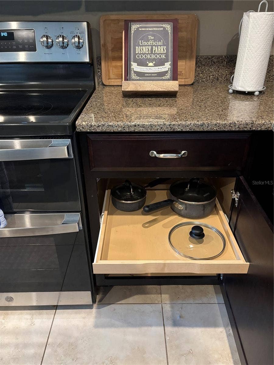 1301 GLENEAGLES LANE, Davenport, FL 33896 Kitchen has high end cabinets that come with pull out drawers