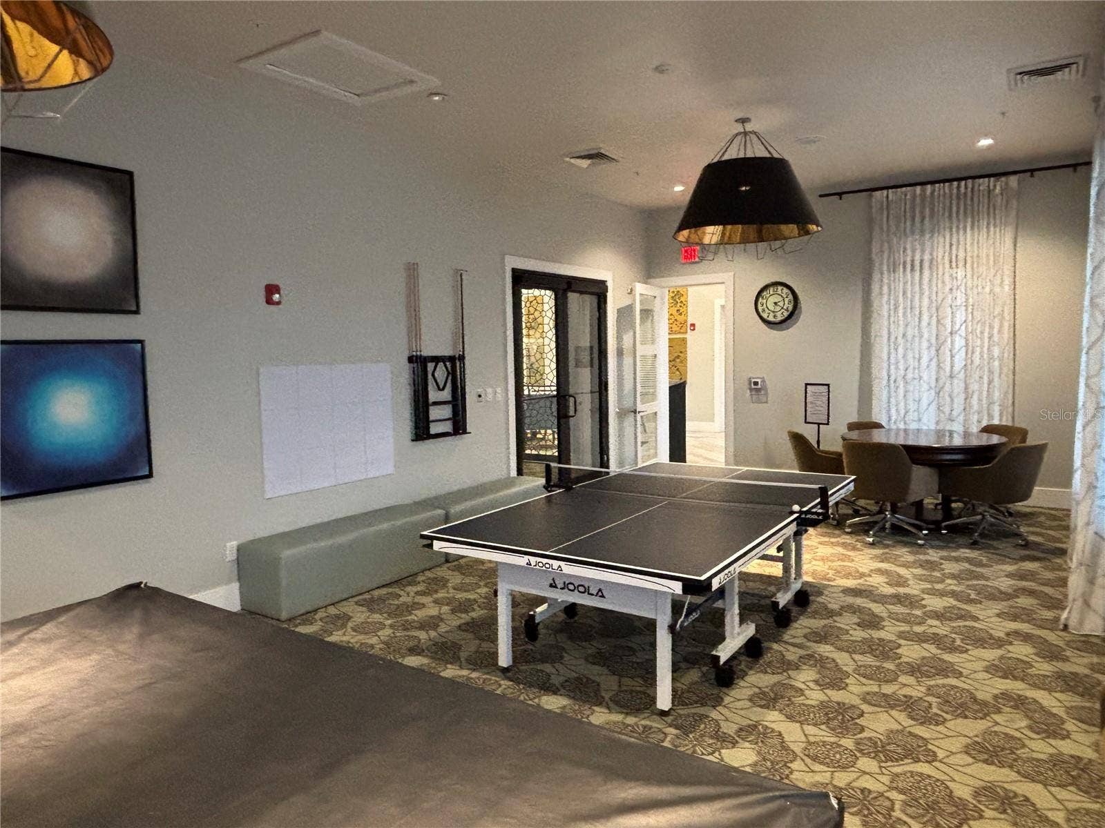 1301 GLENEAGLES LANE, Davenport, FL 33896 The Plaza - resident only game room with pool table, ping pong, card table, tv, etc.