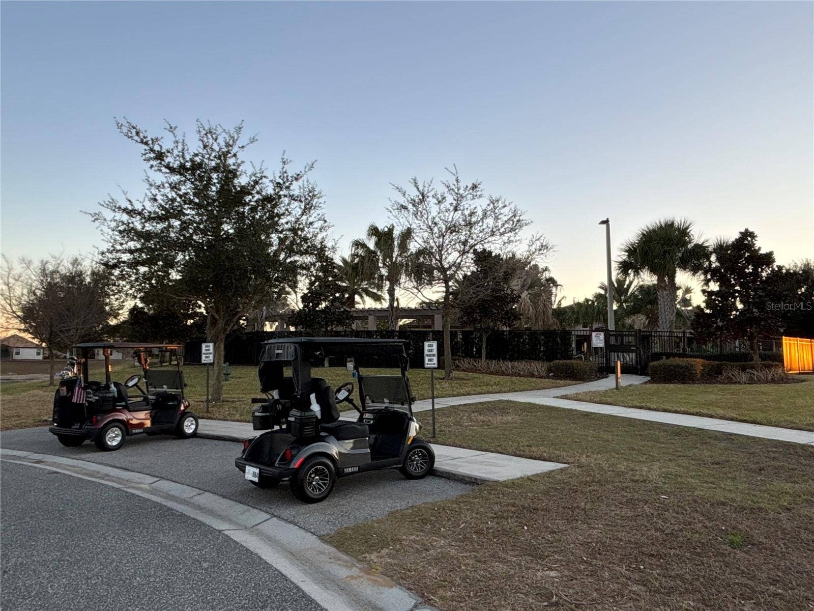 1301 GLENEAGLES LANE, Davenport, FL 33896 Golf cart only parking at the back entrance of The Plaza