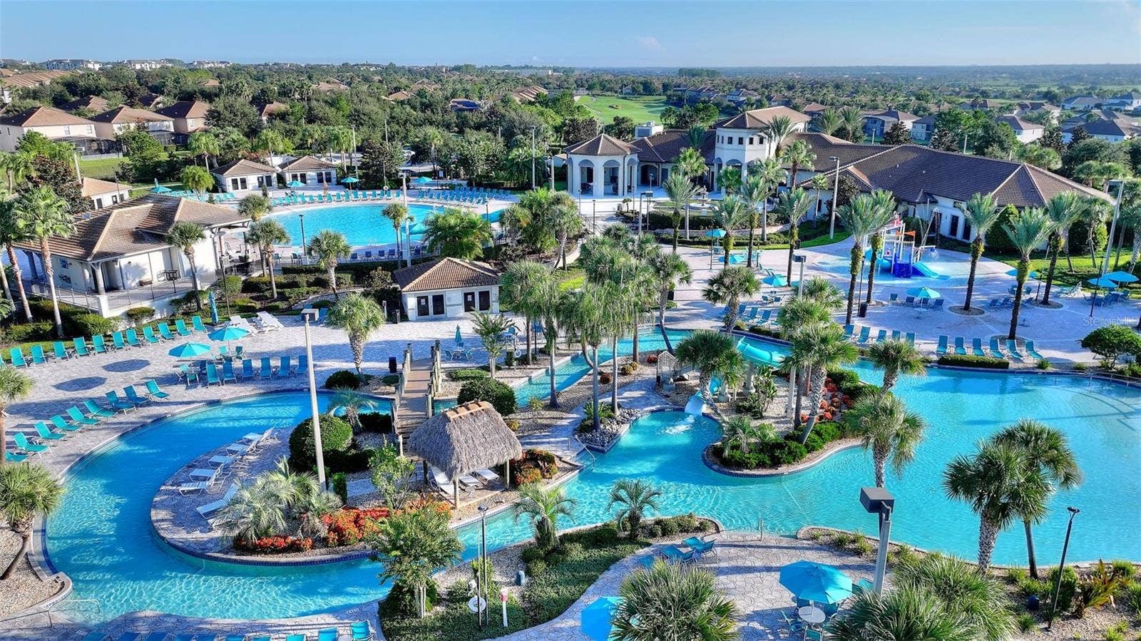 1301 GLENEAGLES LANE, Davenport, FL 33896 Oasis Club Lazy River, Kids Splash Zone, and adult pool