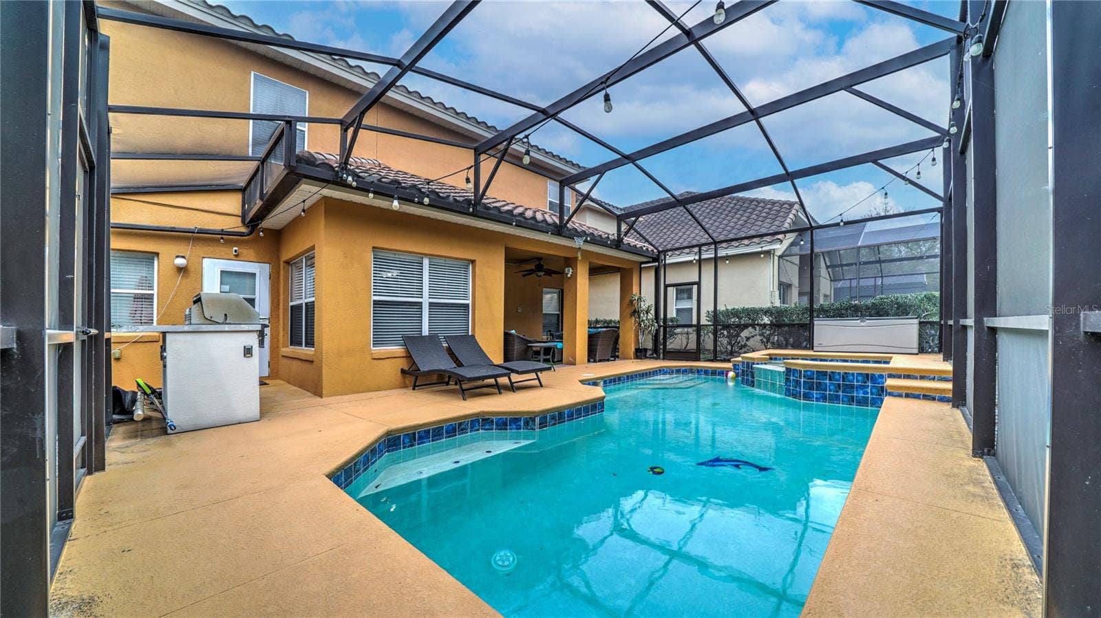 6956 LUCCA STREET, Orlando, FL 32819 Beautifully screened-in pool