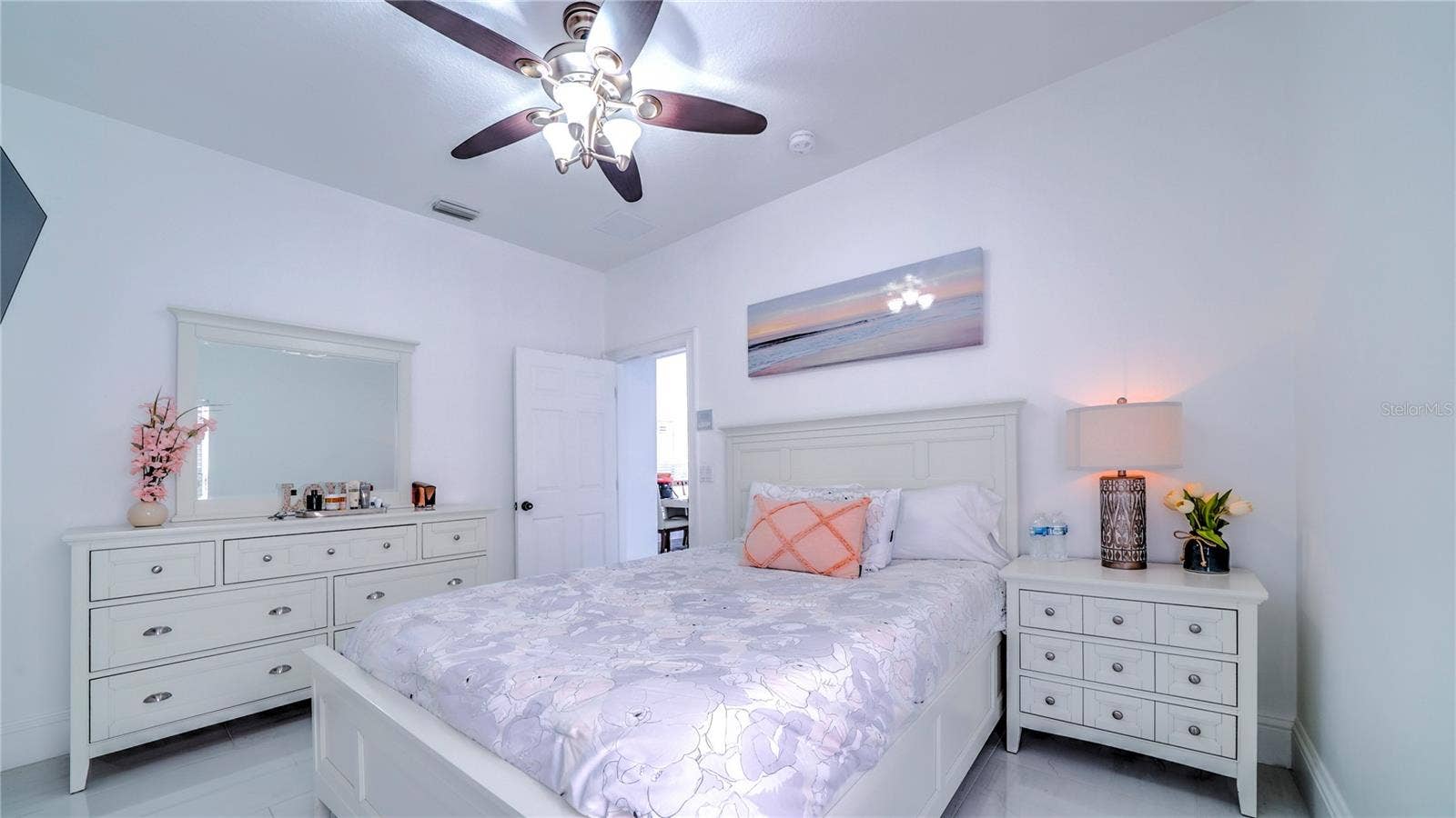 6956 LUCCA STREET, Orlando, FL 32819 Guest bedroom on the first floor with a full bathroom.