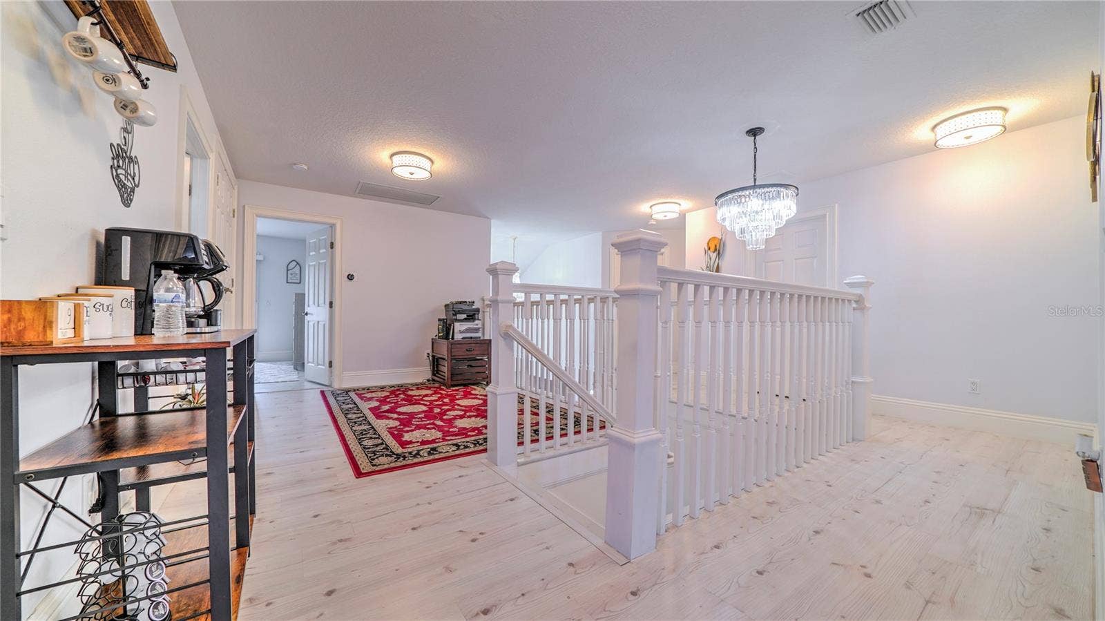 6956 LUCCA STREET, Orlando, FL 32819 Second Floor family area.