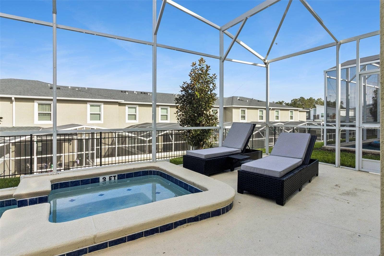 9095 SOMMERSET HILLS DRIVE, Davenport, FL 33896 Outdoor Enclosed Jacuzzi and Lounge Area