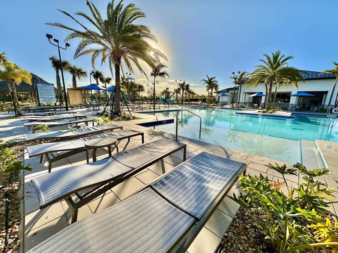 9095 SOMMERSET HILLS DRIVE, Davenport, FL 33896 Resort - Lounge Chairs around Pool Area