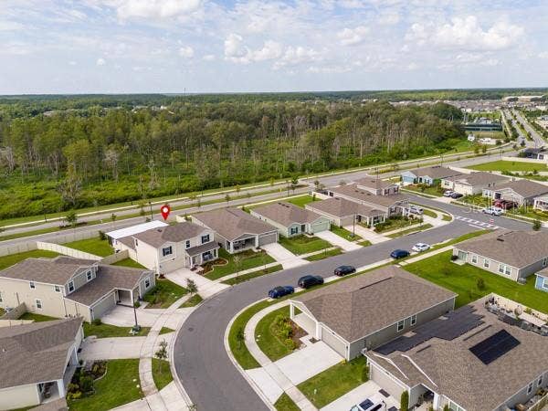 4382 FINCH LANE, Kissimmee, FL 34746 House in context with street