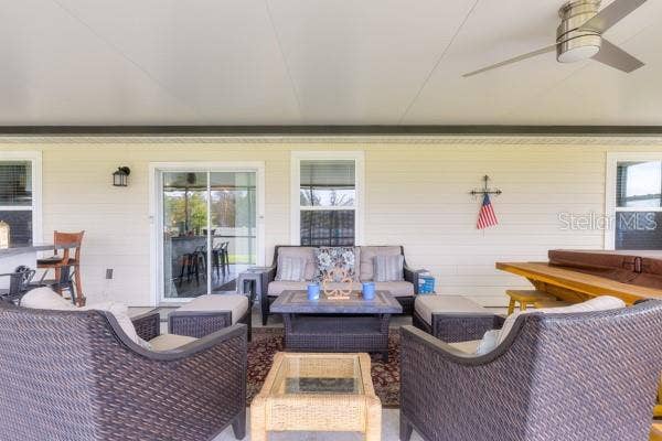 4382 FINCH LANE, Kissimmee, FL 34746 Current seating in lanai
