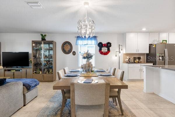 4382 FINCH LANE, Kissimmee, FL 34746 Dining area showing current arrangement