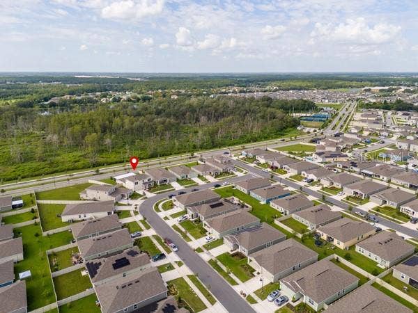 4382 FINCH LANE, Kissimmee, FL 34746 House in context with neighborhood