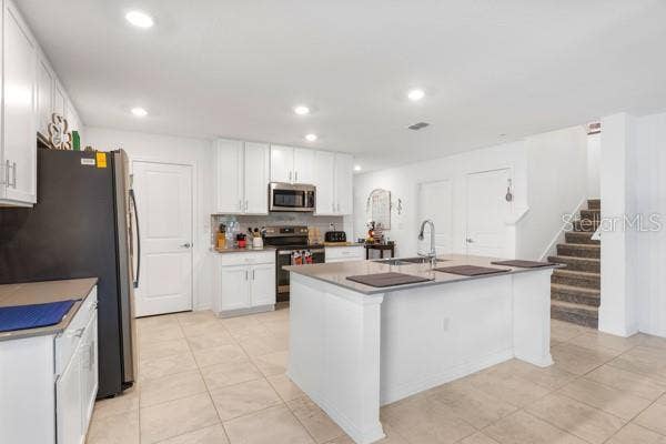 4382 FINCH LANE, Kissimmee, FL 34746 Kitchen and view upstairs