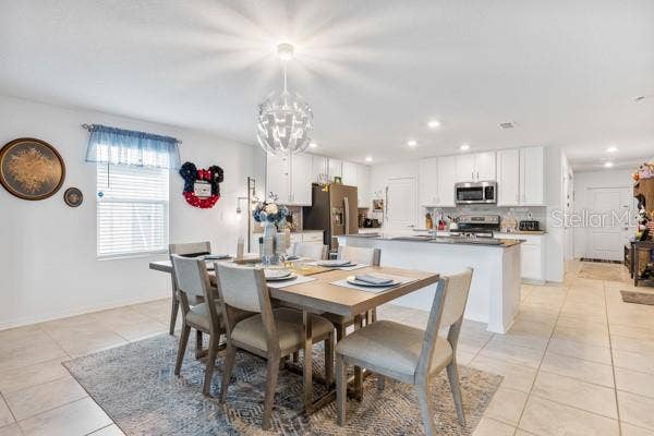 4382 FINCH LANE, Kissimmee, FL 34746 Dining and kitchen areas