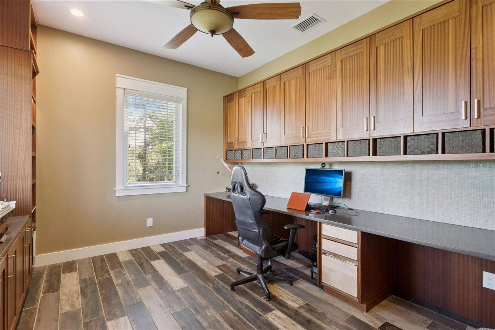 15503 TROTTING HORSE LANE, Tavares, FL 32778 Dedicated office with custom cabinetry