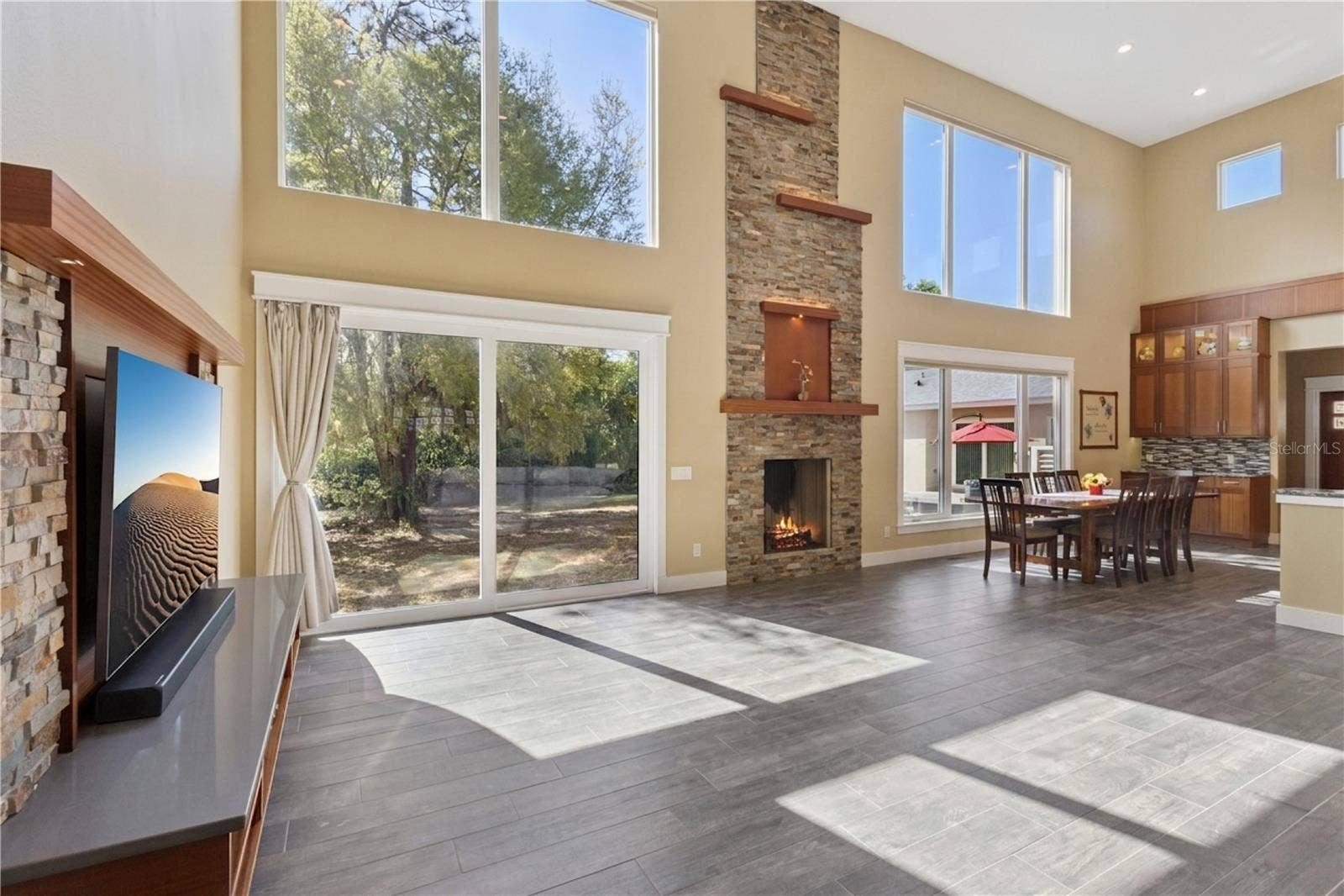 15503 TROTTING HORSE LANE, Tavares, FL 32778 Main living area, open, light and bright with floor to ceiling windows