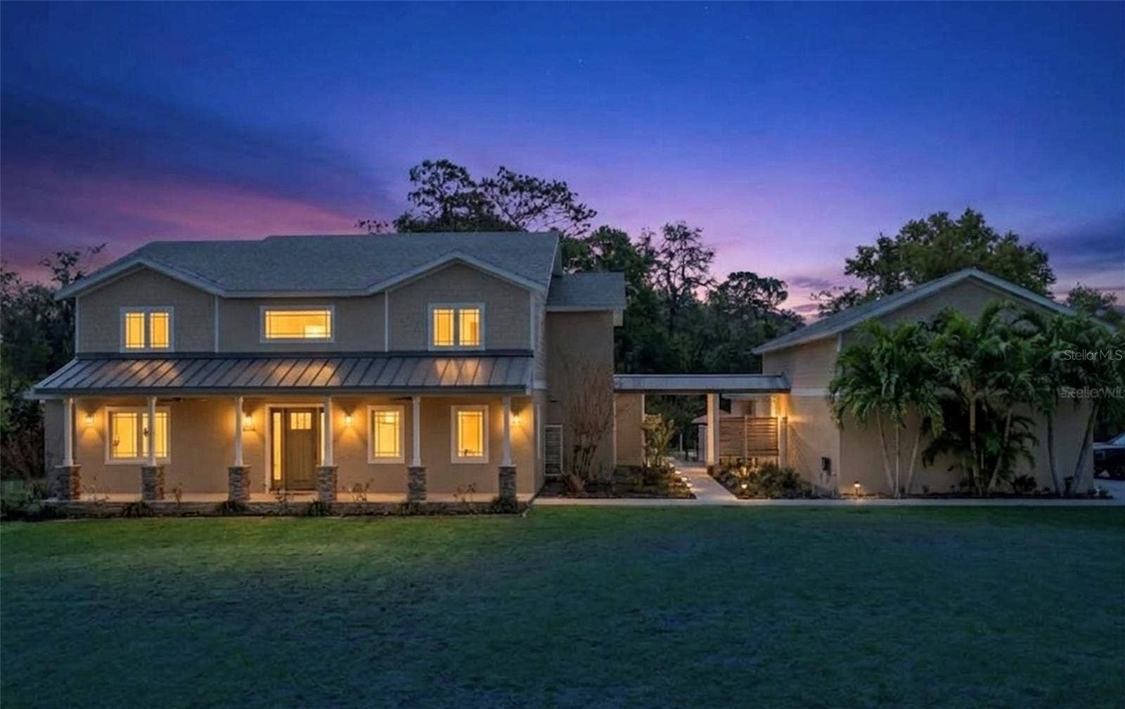 15503 TROTTING HORSE LANE, Tavares, FL 32778 Front of Home Twilight