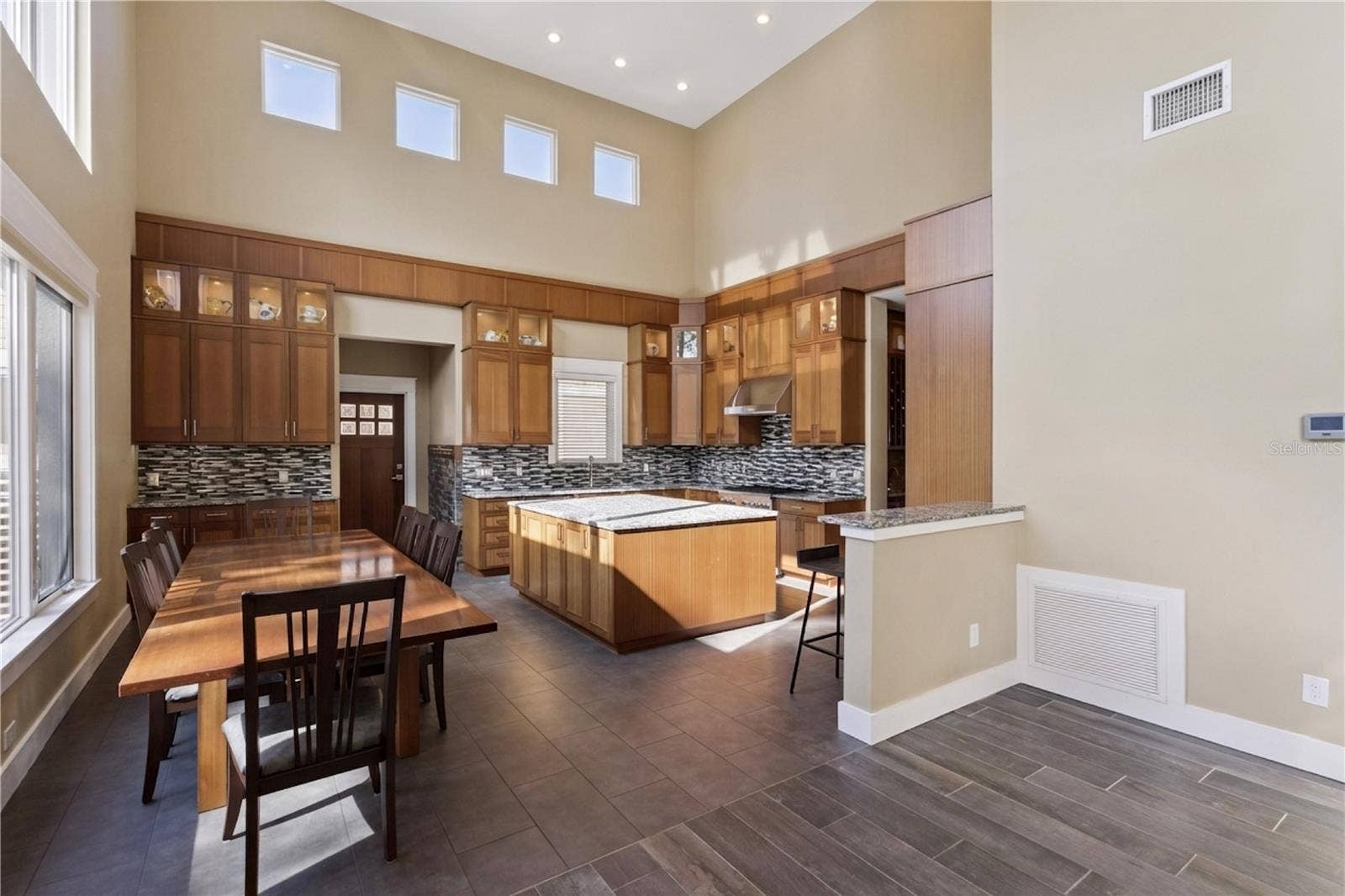 15503 TROTTING HORSE LANE, Tavares, FL 32778 Family room to kitchen