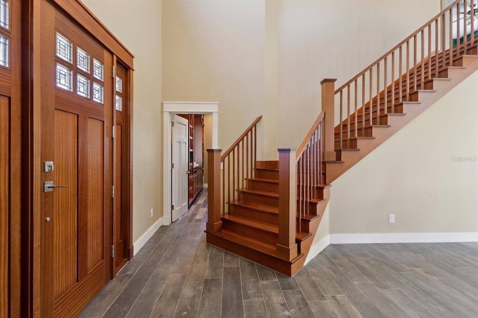 15503 TROTTING HORSE LANE, Tavares, FL 32778 Front entry with Sapele wood staircase