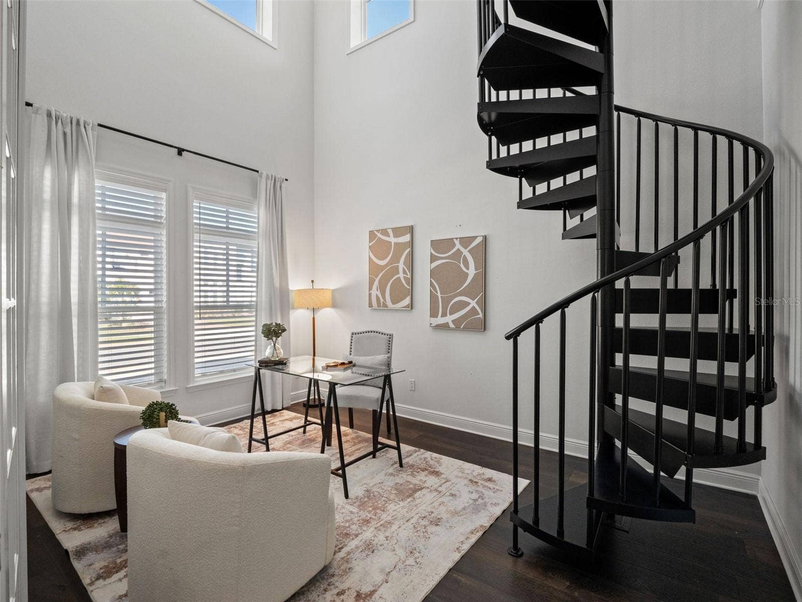 Office with French Doors and Spiral Staircase to upstairs Loft