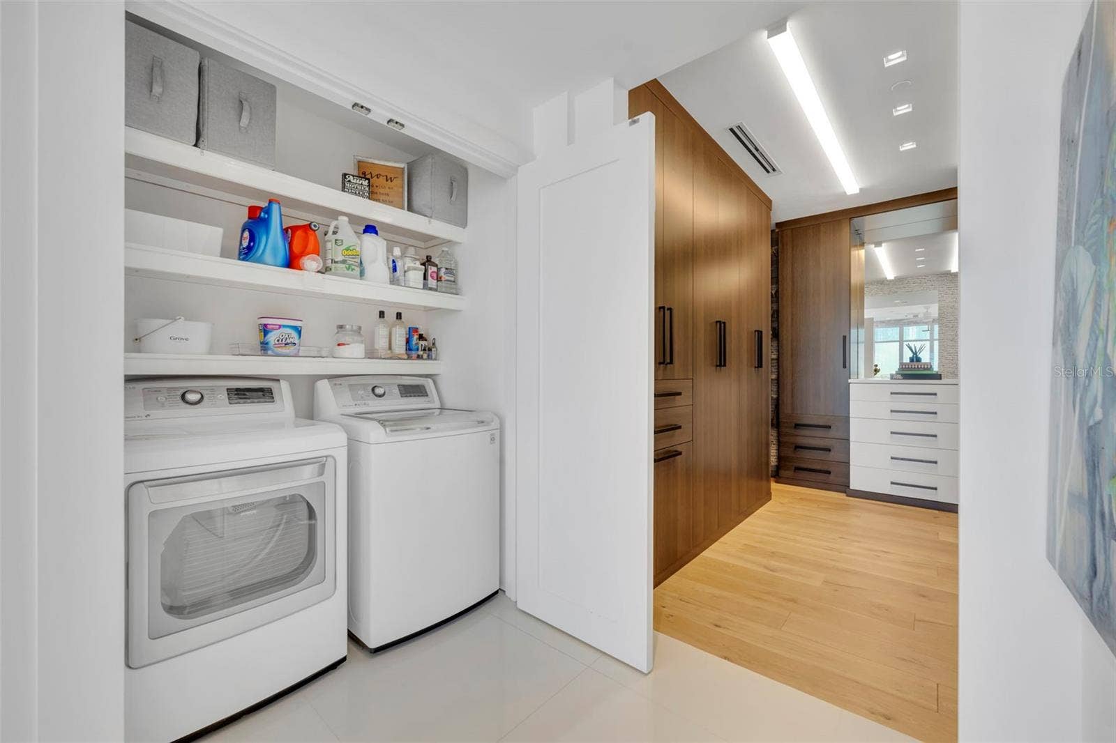 Washer and Dryer located in Primary closet