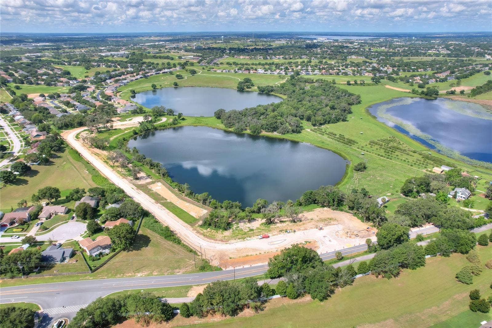 157 TRANQUIL MIRROR LAKE COURT, #Lot 10, Clermont, FL 34711 Looking SW