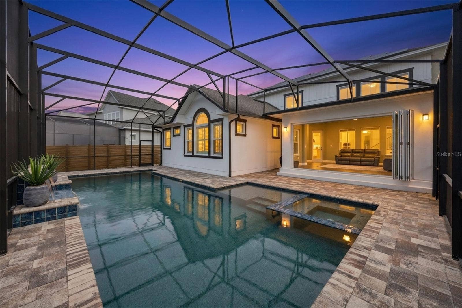 14160 ELIOT AVENUE, Orlando, FL 32827 Pool with Spa and Water Features- Twilight