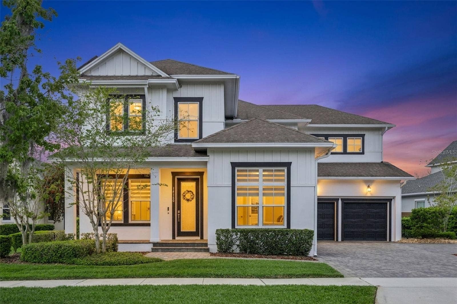 14160 ELIOT AVENUE, Orlando, FL 32827 Front Elevation- Twilight