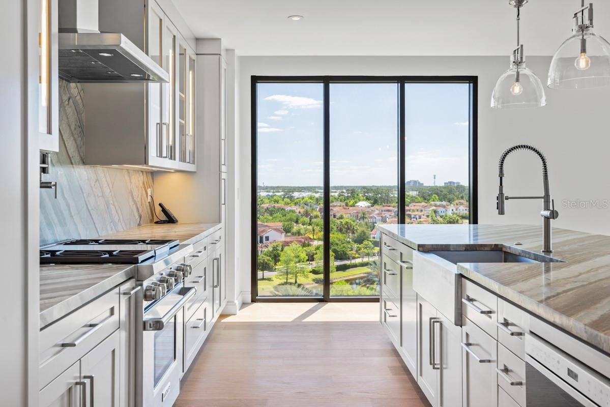 10160 AUTUMN MIST LANE, #800, Golden Oak, FL 32836 Gourmet kitchen with Wolf, Subzero, and Cove Premium Appliances