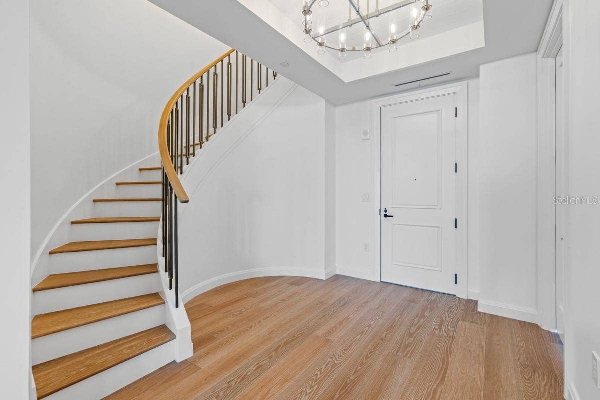 10160 AUTUMN MIST LANE, #800, Golden Oak, FL 32836 Grand staircase to the second floor, or use the private elevator