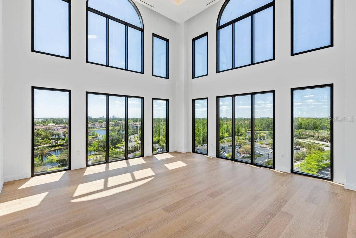 10160 AUTUMN MIST LANE, #800, Golden Oak, FL 32836 Soaring ceilings in the two-story Living Room