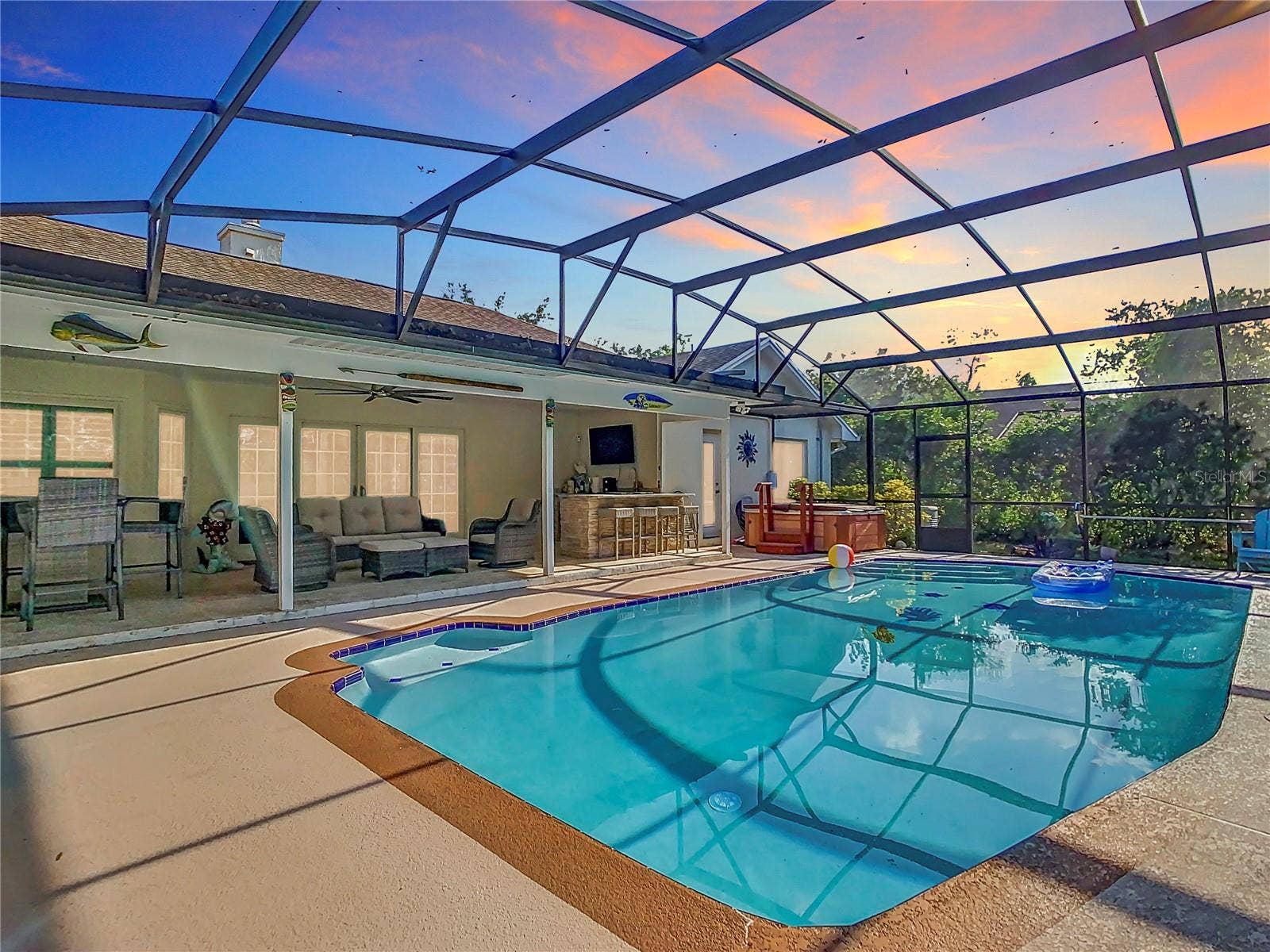 8707 FERNWICKE COURT, Orlando, FL 32819 Welcoming Outdoor Pool and Kitchen