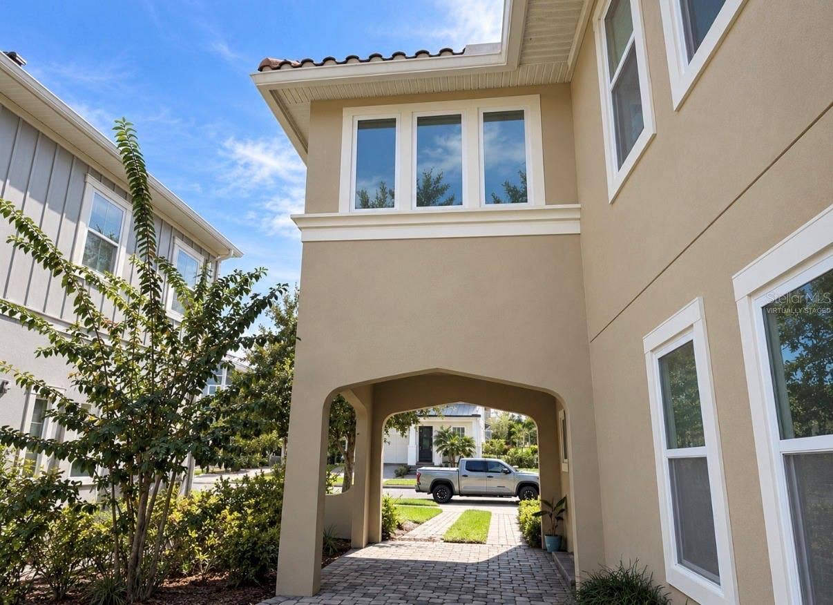 8153 BELLOW STREET, Orlando, FL 32827 Virtually staged With balcony converted to a finished room