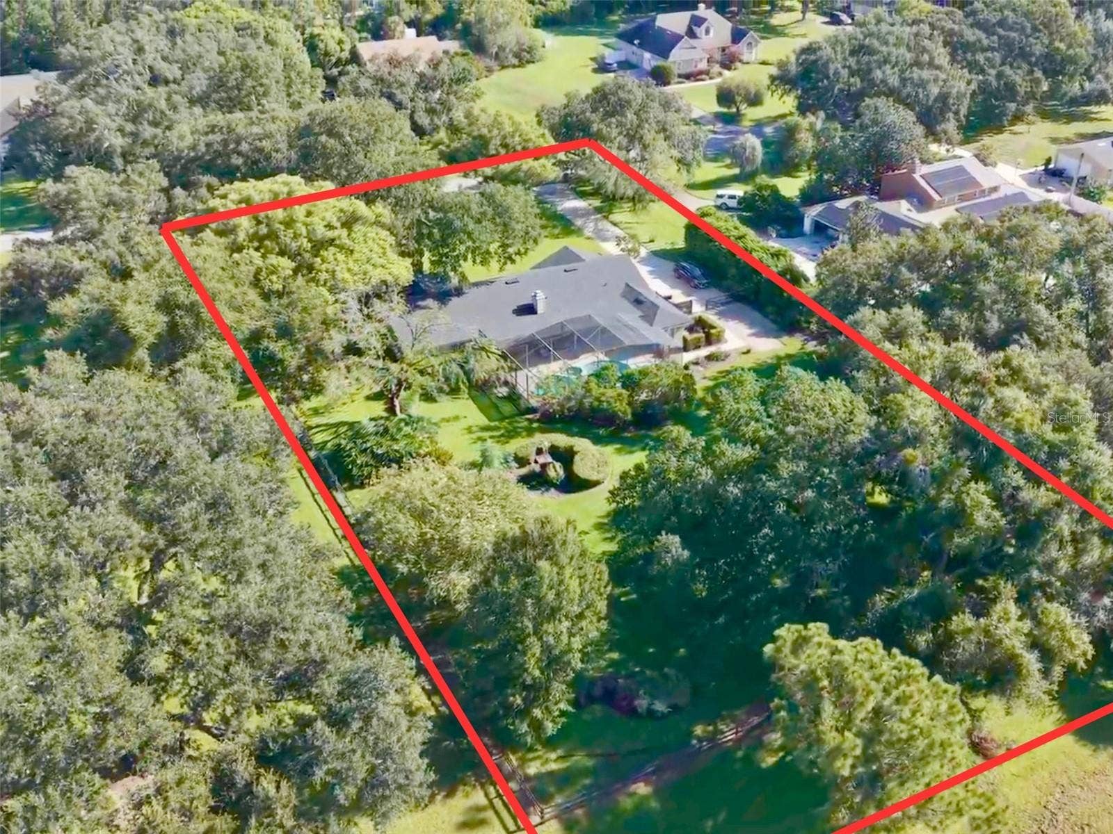 14140 COUNTRY ESTATE DRIVE, Winter Garden, FL 34787 Pool home on over 1-acre lot with beautiful, mature approx 100-year-old oak trees.