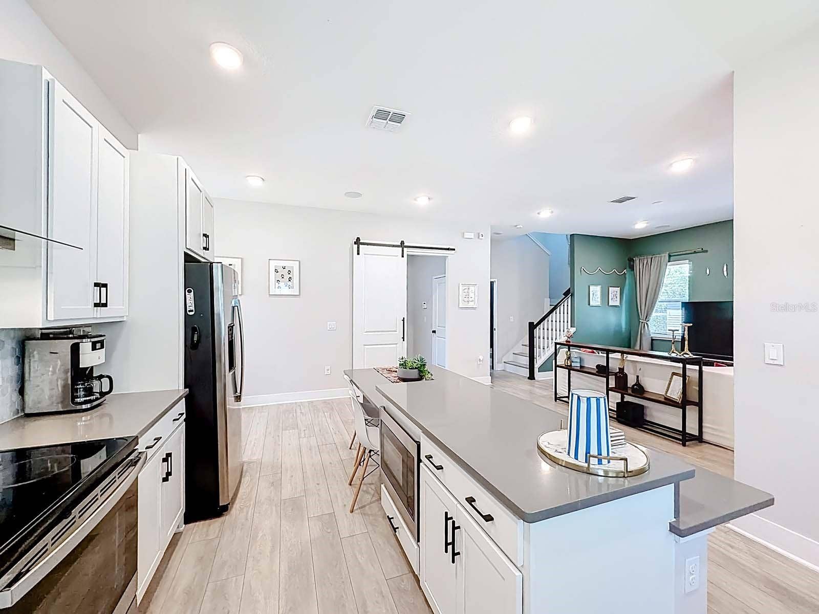 13249 CORMACK LANE, Orlando, FL 32827 Kitchen to Stairs