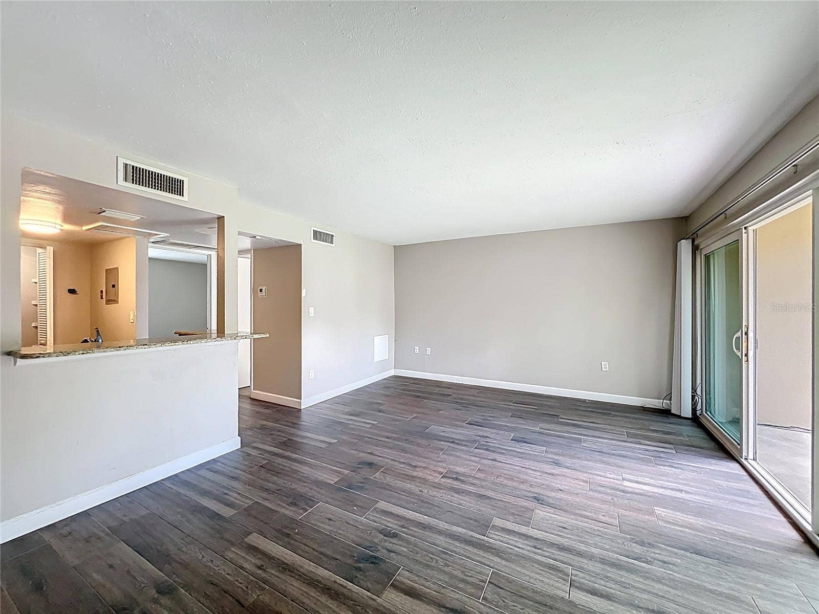 590 ORANGE DRIVE, #136, Altamonte Springs, FL 32701 Living Room/Dining Room Kitchen