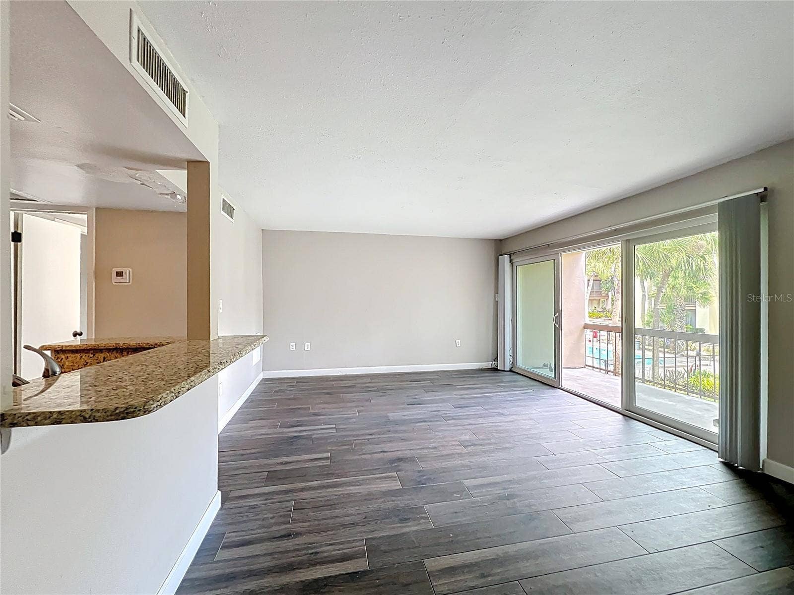 590 ORANGE DRIVE, #136, Altamonte Springs, FL 32701 Living Room/Dining Room Kitchen