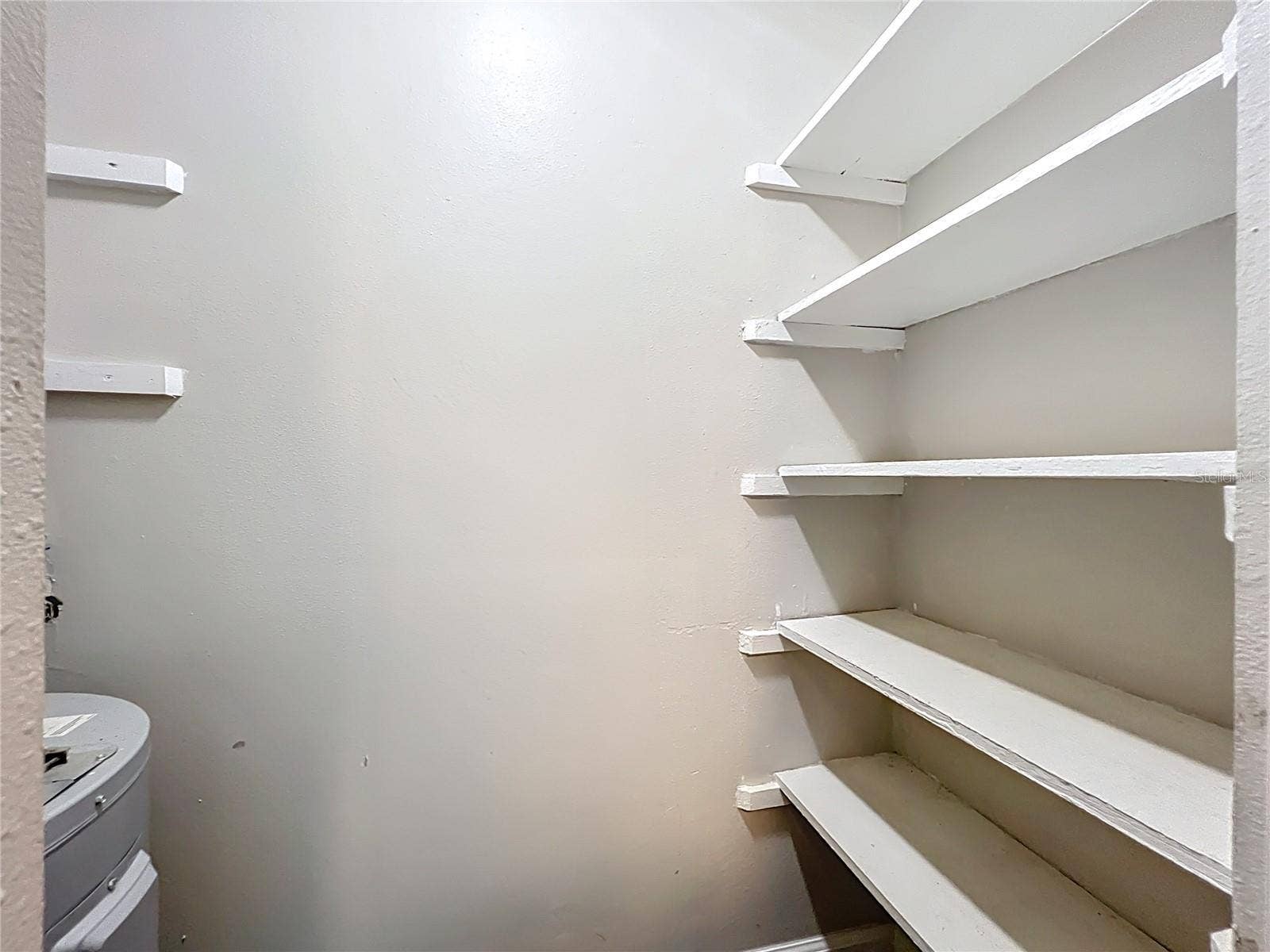590 ORANGE DRIVE, #136, Altamonte Springs, FL 32701 Kitchen Pantry and water heater