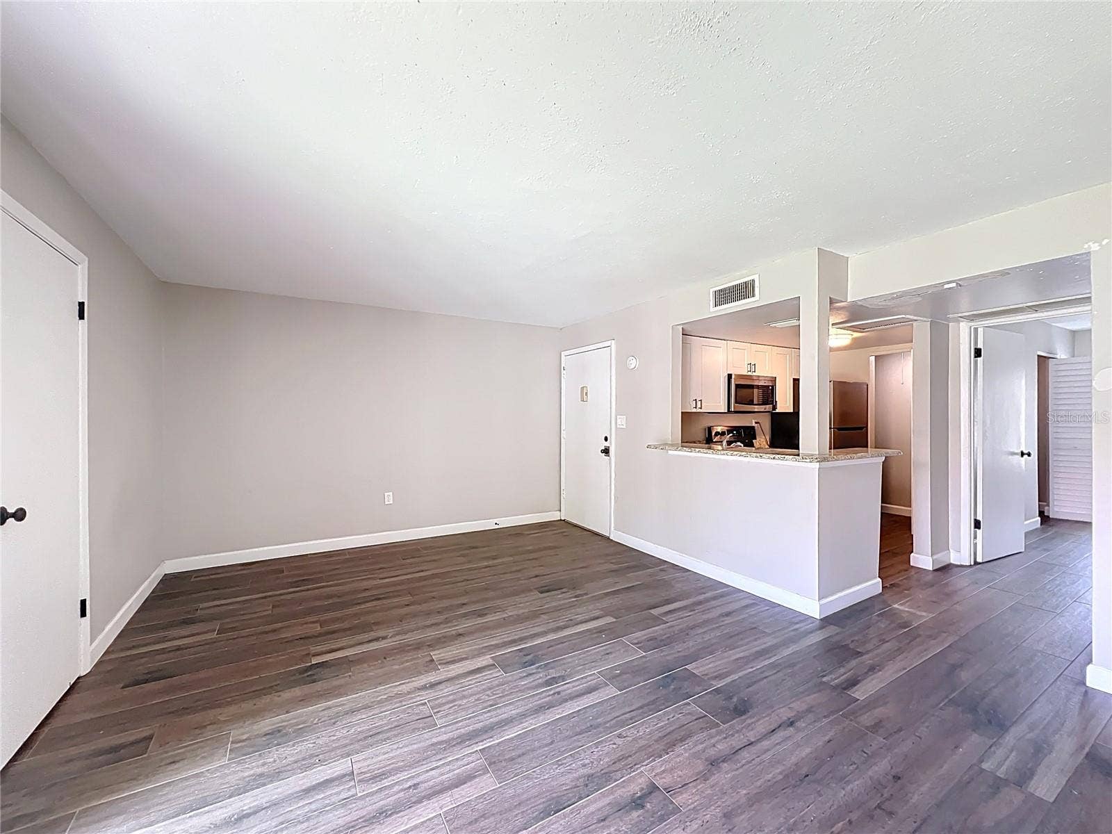 590 ORANGE DRIVE, #136, Altamonte Springs, FL 32701 Living Room/Dining Room Kitchen
