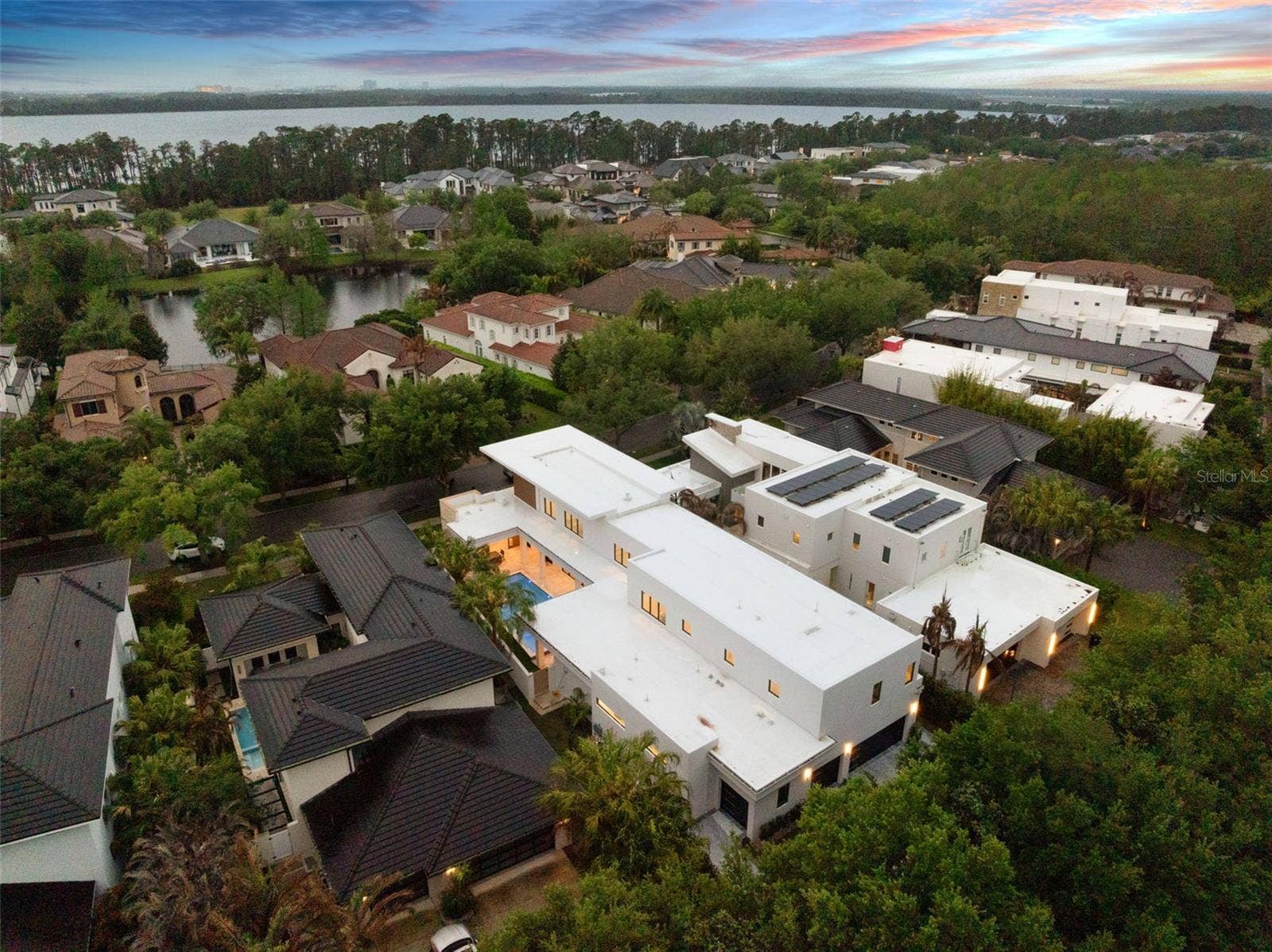 8643 FARTHINGTON WAY, Orlando, FL 32827 Aerial at Dusk