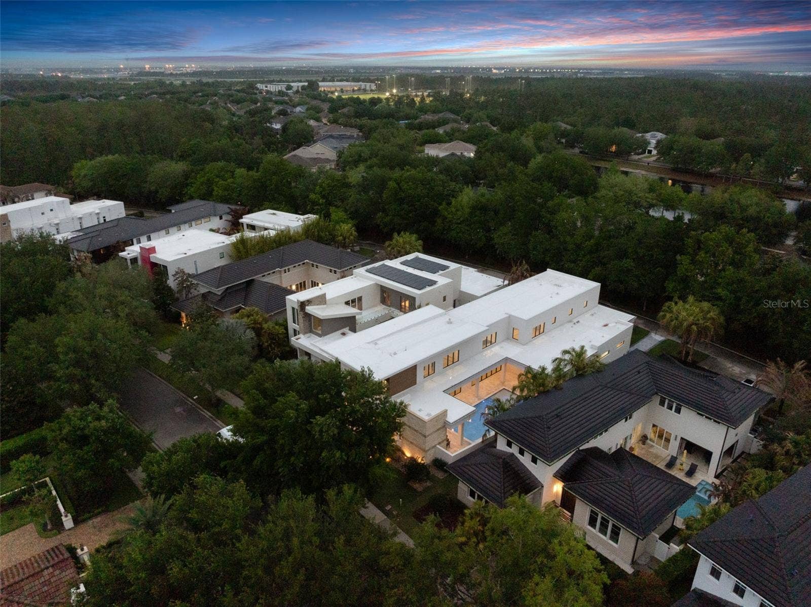 8643 FARTHINGTON WAY, Orlando, FL 32827 Aerial at Dusk